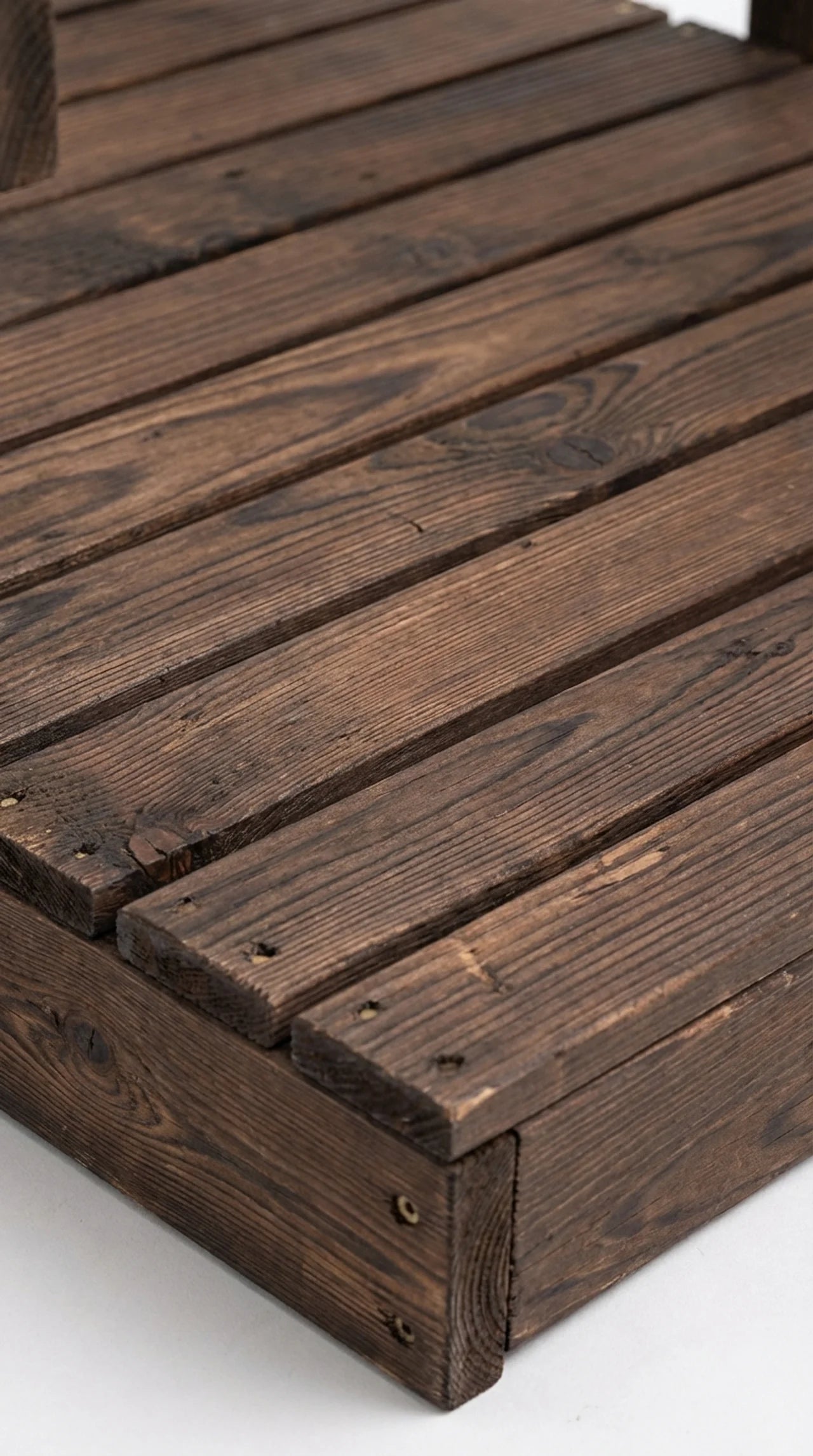 Close-up of stained pine deck boards 